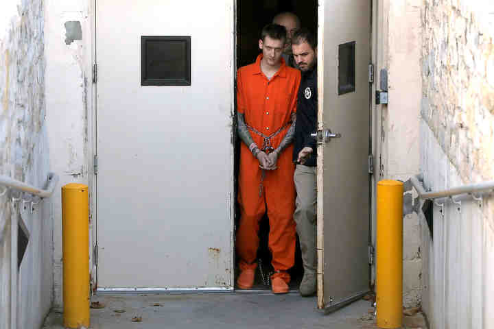 Terror suspect Vincent Armstrong is led out of the United States District Court for the Northern District of Ohio in Toledo following a hearing. Armstrong is the boyfriend of Elizabeth Lecron, and has been linked to Lecron’s alleged planned attack on a Toledo bar. He was charged with providing false information to law enforcement. Officials allege he denied discussing plans to launch an attack with Lecron and denied purchasing items that could be used to make a bomb.